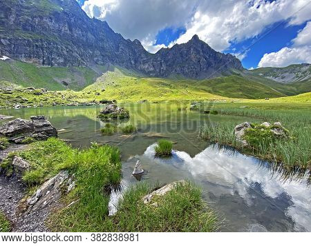 The Alpine Lake Blausee Or Blue Lake In The Uri Alps Mountain Massif, Melchtal - Canton Of Obwald, S