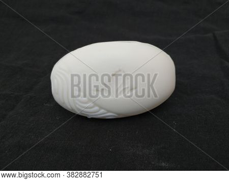 Closeup Of Pack Opened And Closed White Color Santoor Sandal And Almond Milk Soap Bar Isolated On Bl