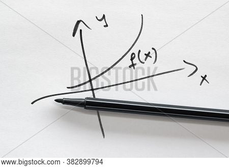 Hand Drawn Graph Of An Arbitrarily Chosen Function And A Felt Pen