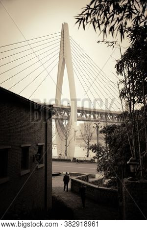 Dongshuimen Bridge viewed from Xiahao Old street in Chongqing, China.