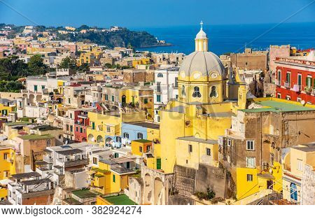 Aerial Drone View Of Vibrantly Colorful Houses Of Marina Corricella In Sunny Summer Weather At Proci