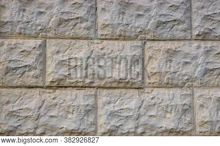 Gray Rough Tiles On The Wall. Background Texture