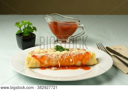 Delicious Meat Pancake With Red Sauce And Parmesan Cheese