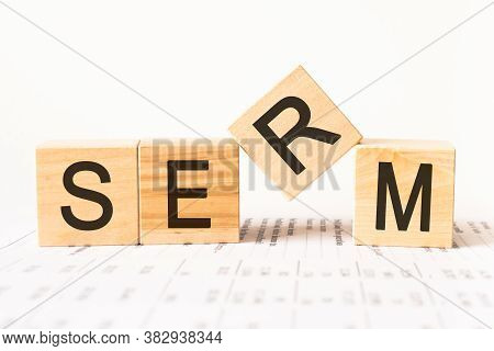 Word Serm. Wooden Small Cubes With Letters Isolated On White Background With Copy Space Available.bu