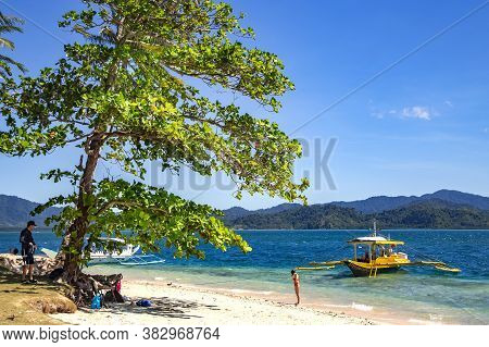Philippines, El Nido, Palawan, December, 2019 - A Pleasure Ship Sailed On Wild Beautiful Beach In Th