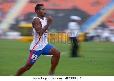 DONETSK, UKRAINE - JULY 13: Reynier Mena of Cuba win the heat in semi-final on 200 metres during 8th IAAF World Youth Championships in Donetsk, Ukraine on July 13, 2013