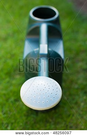 Grøn plast vandkande