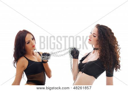 Sexual young babes posing with chain, close-up
