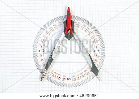 Tools For Plotting Compass And Protractor. On A White Background.