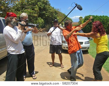 Tom Althouse and Fileena Bahris on the set of 