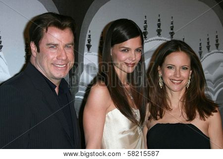 John Travolta with Katie Holmes and Kelly Preston at the Giorgio Armani Prive Show to celebrate the Oscars. Green Acres, Los Angeles, CA. 02-24-07