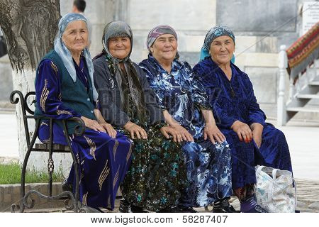 Four old woman sitting on a bench, Samarkand, Uzbekistan