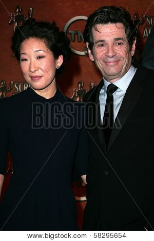 Sandra Oh and Alan Rosenberg at the press conference announcing the nominations for the 13th Annual Screen Actors Guild Awards. Pacific Design Center, West Hollywood, CA. 01-04-07