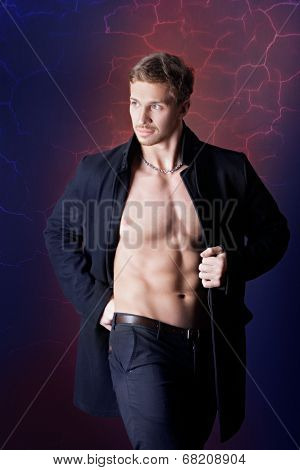 muscular man in a coat.