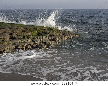 Sea Waves Hitting Rocky Shore