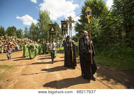 KRASNY BRONEVIK, RUSSIA - JULY 7, 2014: Celebrations commemorating the Rev. Anthony Dymsky (died 1224) in Antony Dymsky Monastery - Procession on Lake Dymsky, the great blessing of water and bathing.