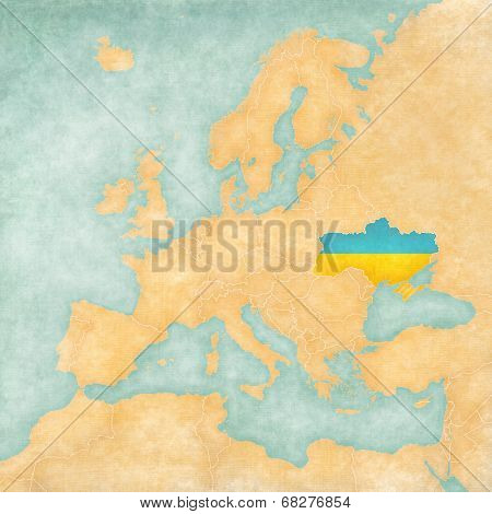 Ukraine (Ukrainian flag) on the map of Europe. The Map is in vintage summer style and sunny mood. The map has a soft grunge and vintage atmosphere which acts as watercolor painting on old paper.