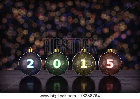 four baubles with different colors and numbers in it against bokeh background