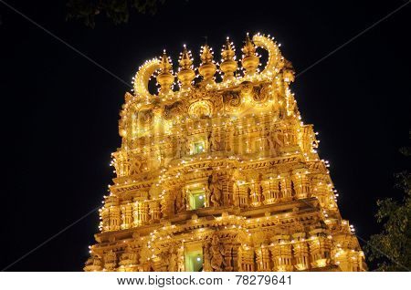 Illuminated Hindu temple in Mysore palace, India