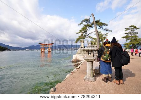 Tourists Visit Itsukushima Shrine In Miyajima, Japan