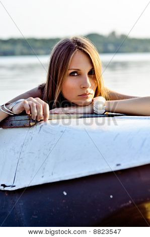 Potrait Of Beautiful Woman On The Beach