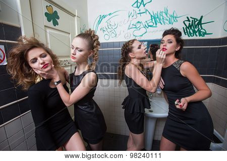 drunk girl in toilet bars. women in evening dresses in alcoholic intoxication
