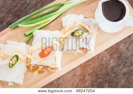 Fresh Spring Rolls On Wooden Table