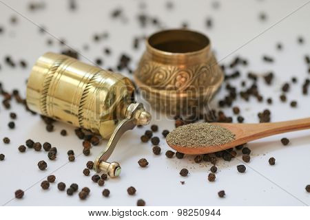 Brass pepper mill.