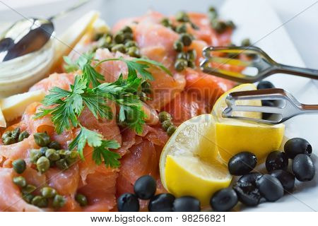Trinley sliced salmon on plate with garnish