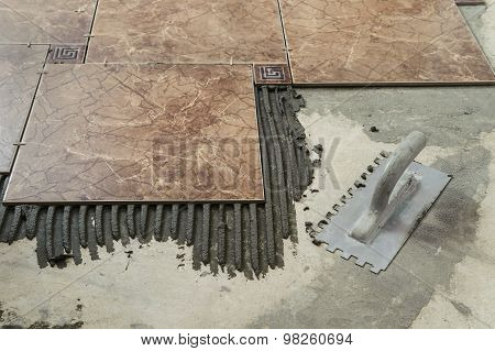 Ceramic Tiles And Adhesive Comb