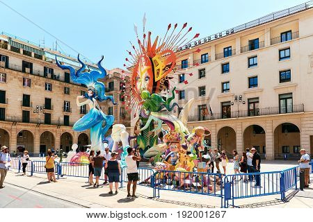 Alicante Spain - June 20 2017: Preparation for The Bonfires of Saint John holiday in the Alicante city. Decorations are structures made of cardboard wood or cork which are exhibited in the streets of Alicante during the festival and are set on fire on the