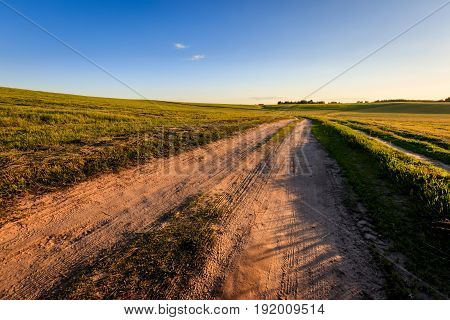 Road Through Cultivating The Land In The Countryside.