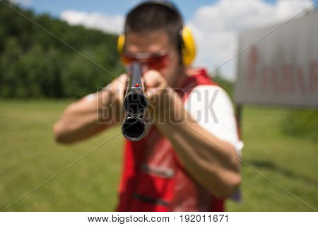 Man aiming shotgun at you. shooting, shot