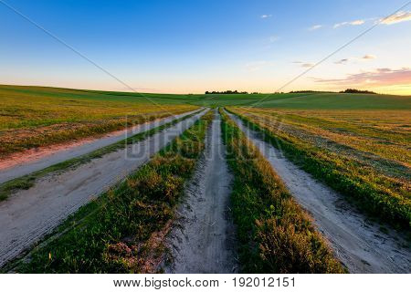Road Through Cultivating The Land In The Countryside.