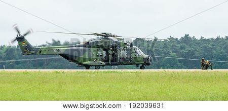 BERLIN GERMANY - JUNI 01 2016: Landing helicopter NH90 of the German Army. Exhibition ILA Berlin Air Show 2016