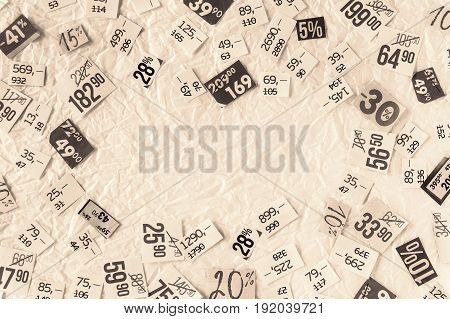 DISCOUNTS sepis background of cut paper figures.
