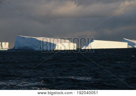 Giant tabular icebergs floating in the Weddell Sea, in Antarctica.
