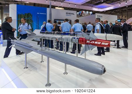 BERLIN GERMANY - JUNE 01 2016: The stand of Diehl Defence. Models of military missiles AIM-2000 IRIS-T and Laser-Guided Sidewinder (LaGS). Exhibition ILA Berlin Air Show 2016.