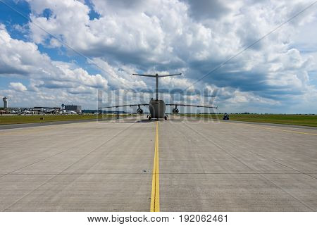 BERLIN GERMANY - JUNE 02 2016: Military transport aircraft Antonov An-178 on the taxiway. Waiting takeoff. Exhibition ILA Berlin Air Show 2016