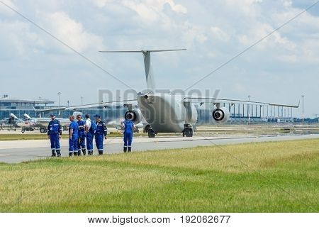 BERLIN GERMANY - JUNE 02 2016: Military transport aircraft Antonov An-178 on the taxiway. Waiting takeoff. Exhibition ILA Berlin Air Show 2016