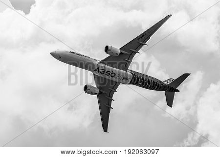 BERLIN GERMANY - JUNE 02 2016: Demonstration flight Airbus A350 XWB. Black and white. Exhibition ILA Berlin Air Show 2016
