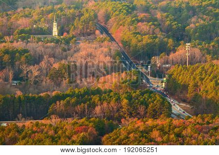 Aerial view of Hugh Howell Road and forest from the top of the Stone Mountain Georgia USA