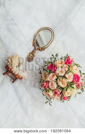bride mirror and flowers on whie background