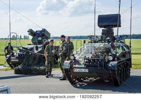 BERLIN GERMANY - JUNE 03 2016: German light air-transportable armoured fighting vehicle Wiesel AWC. Exhibition ILA Berlin Air Show 2016