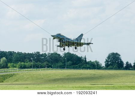 BERLIN GERMANY - JUNE 03 2016: Landing multirole fighter Eurofighter Typhoon. Exhibition ILA Berlin Air Show 2016