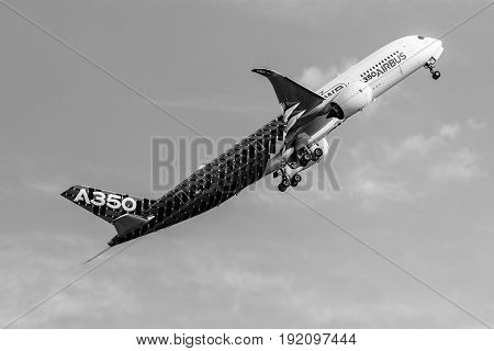 BERLIN GERMANY - JUNE 03 2016: Demonstration flight Airbus A350 XWB. Black and white. Exhibition ILA Berlin Air Show 2016