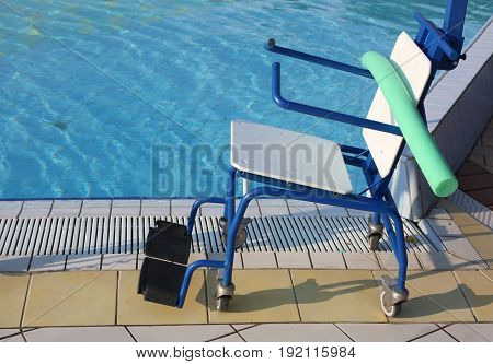 Special Wheelchair To Enter The Pool For Rehabilitative Gymnasti