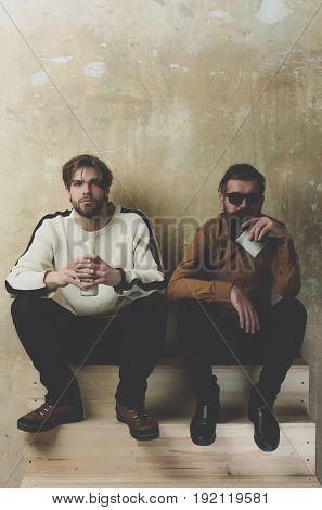 Man With Milk Bottle And Bearded Model With Hip Flask