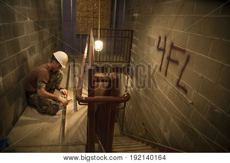 US Navy Seabees help Habitat for Humanity NYC on a housing building project in Brooklyn during Fleet Week New York, celebrating Sea Services and 75th anniversary of the Seabees, NEW YORK MAY 25 2017.
