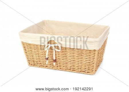 Empty wicker bread basket isolated on white